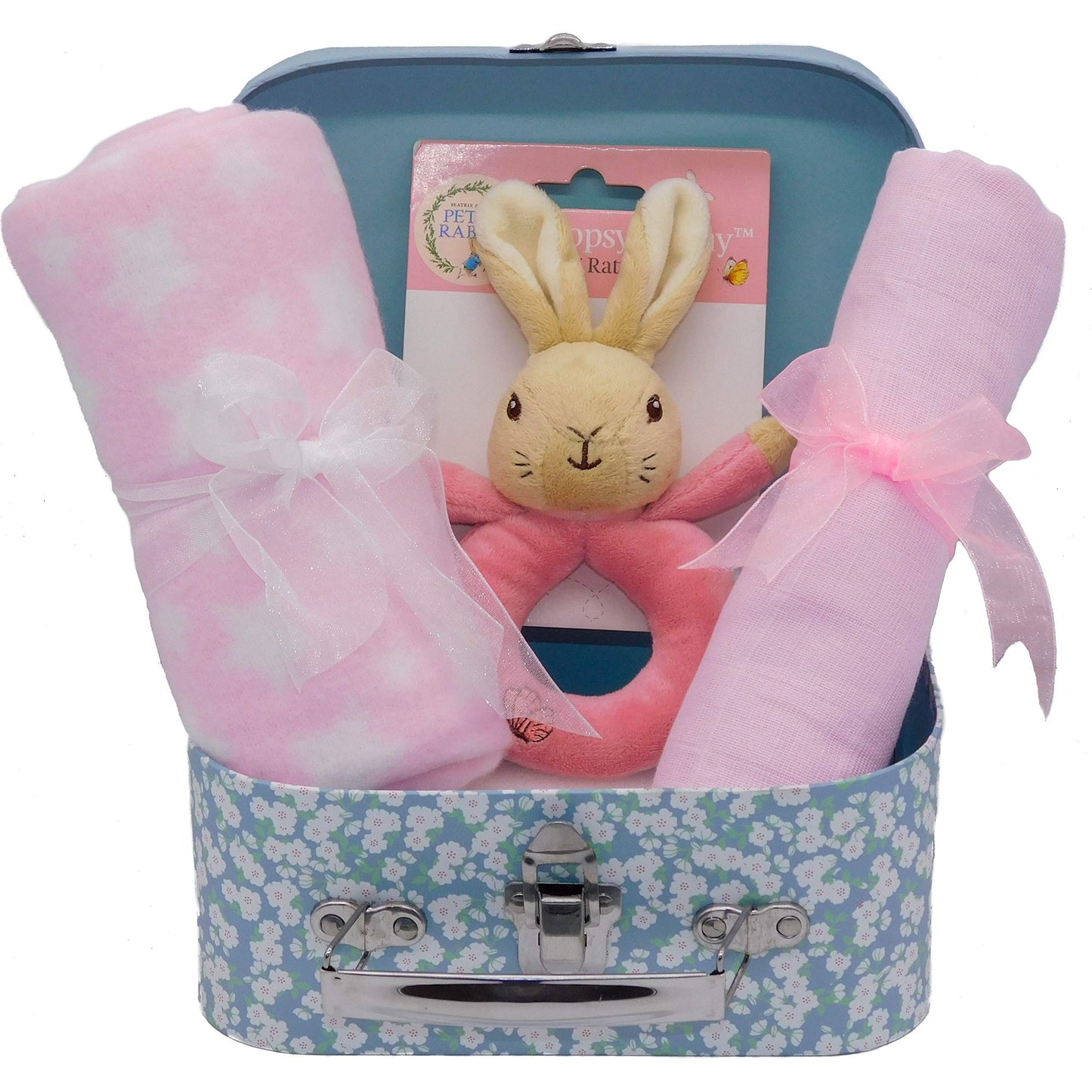 Baby gift set with a plush Flopsy Bunny ring rattle, pink blanket, pink muslin square and Peter Rabbit suitcase on a white background