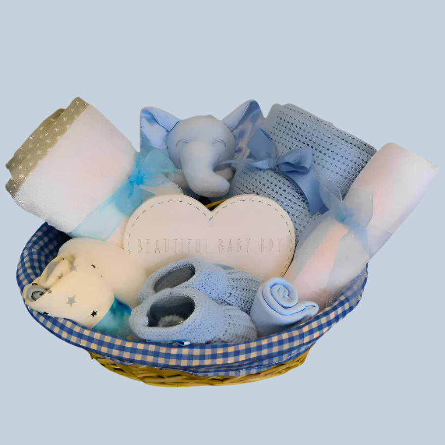 Baby gift basket with toys and blankets on a blue background
