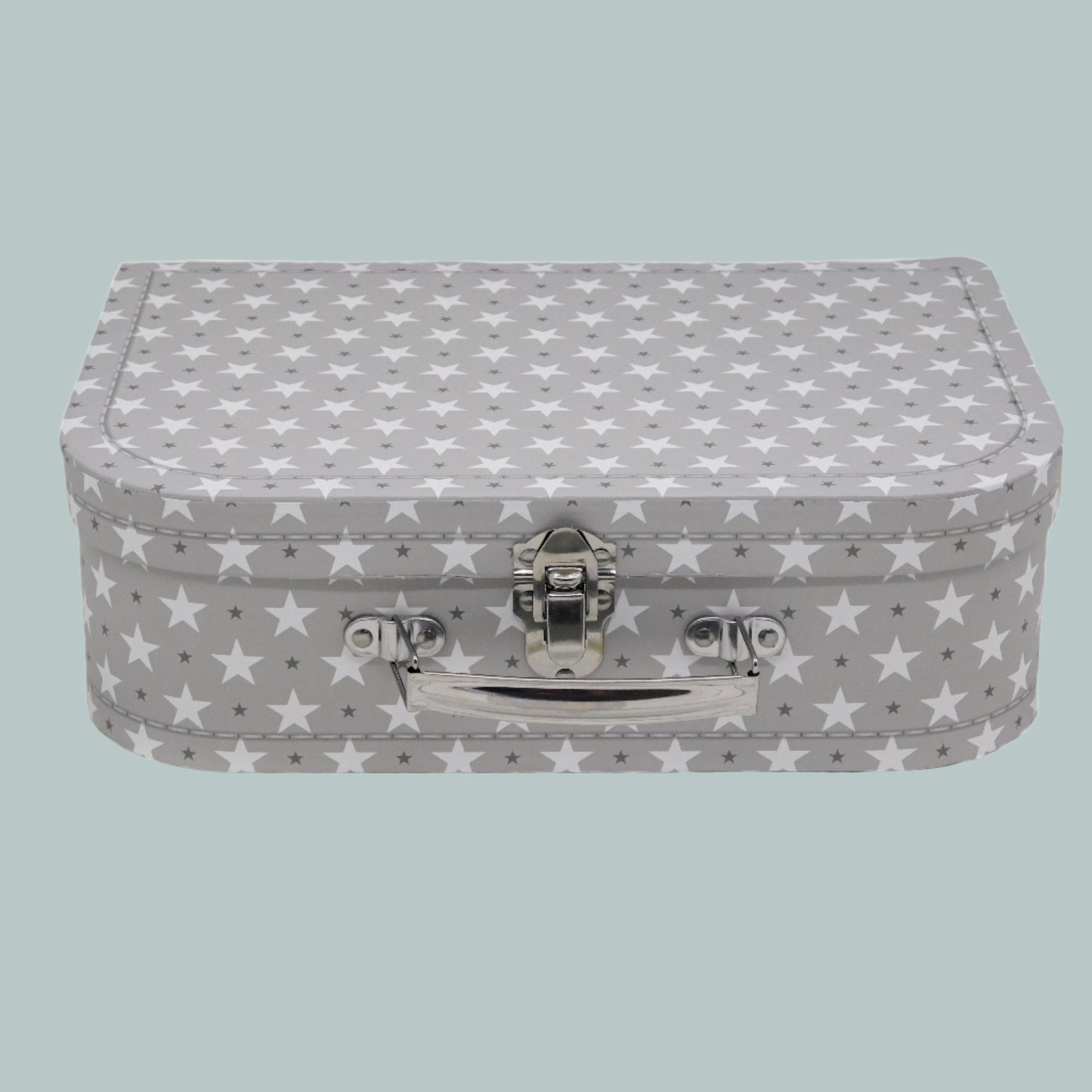 Grey keepsake suitcase with star pattern on a neutral background
