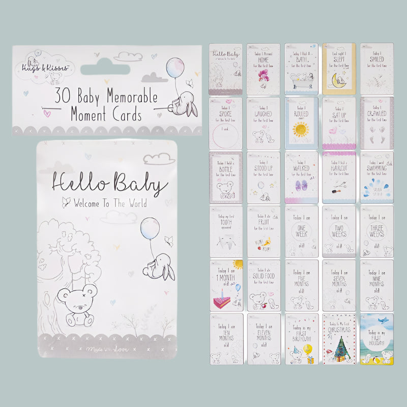 Set of baby milestone cards with packaging on a neutral background