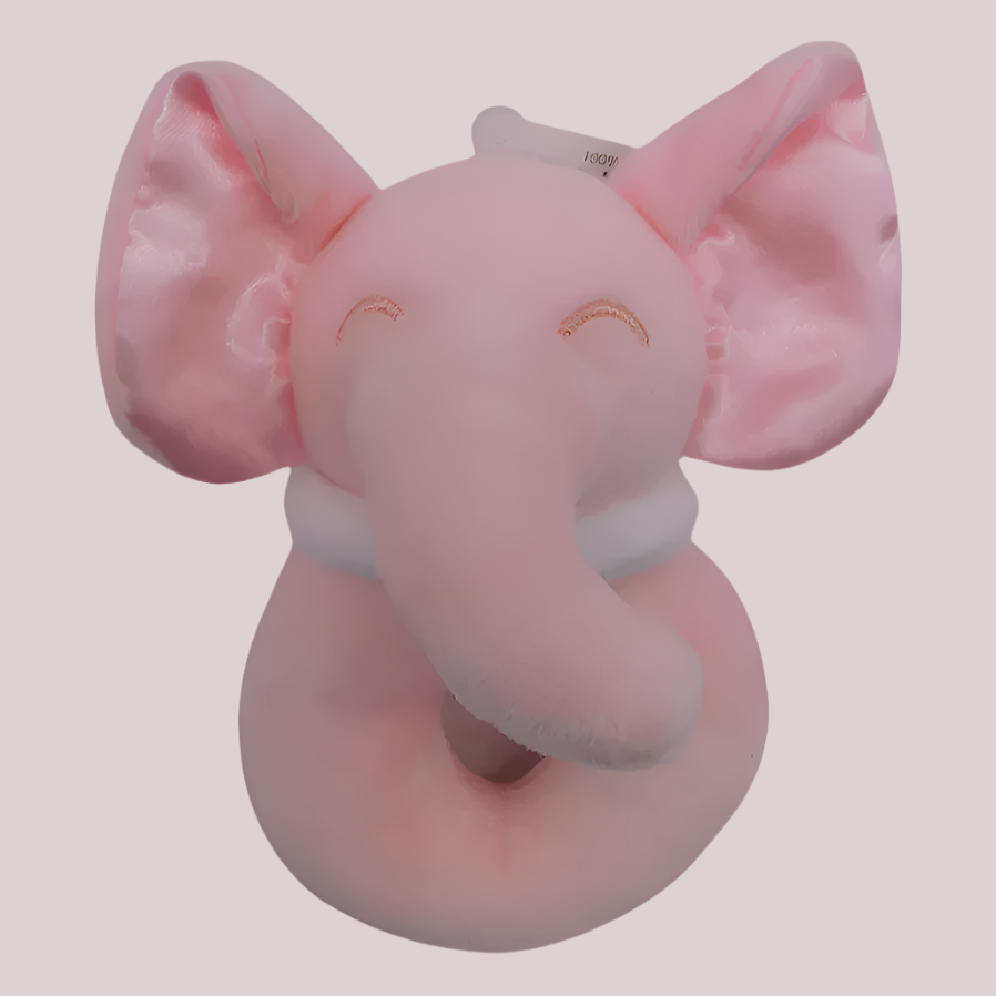Pink elephant plush rattle on a pink background