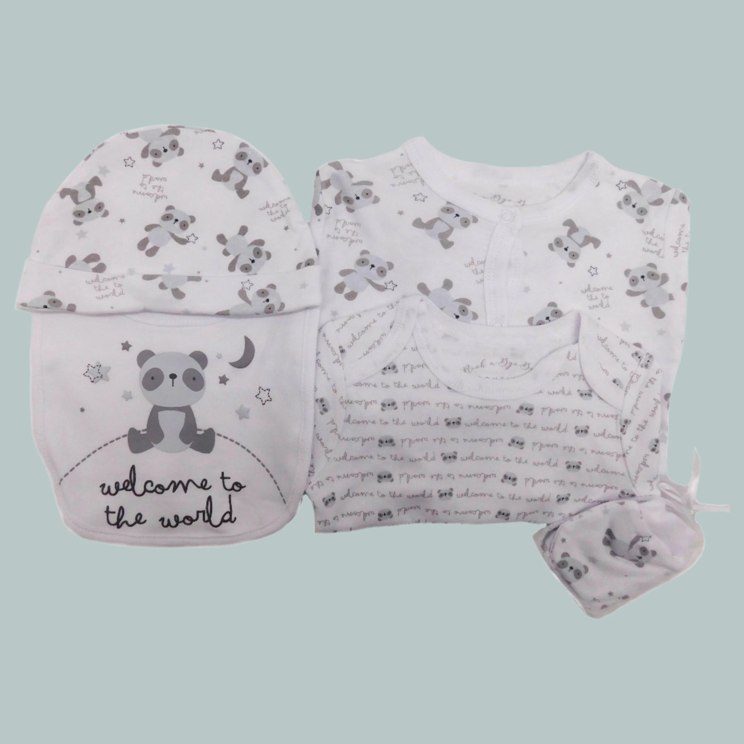 Baby clothing set with hat, bib, sleepsuit, bodysuit and mittens on a neutral background