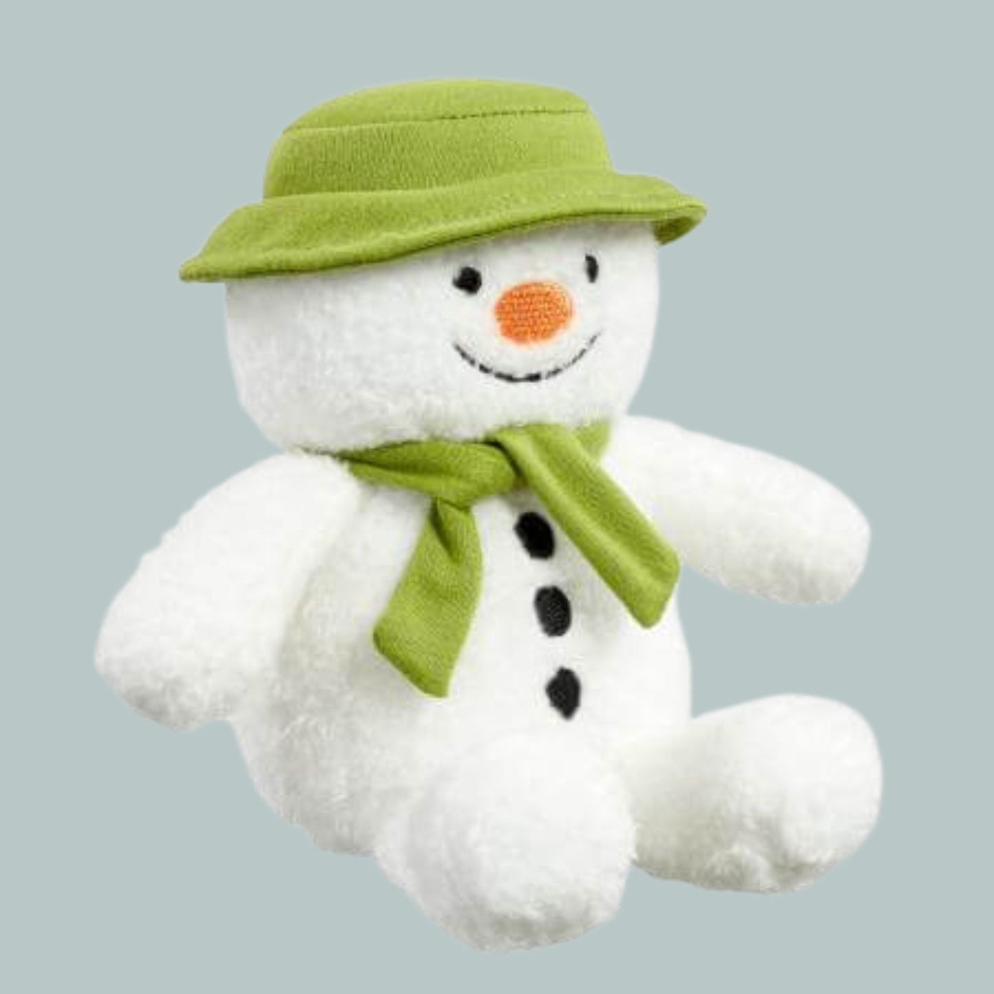 The Snowman plush bean toy wearing a green hat and scarf, with an orange nose