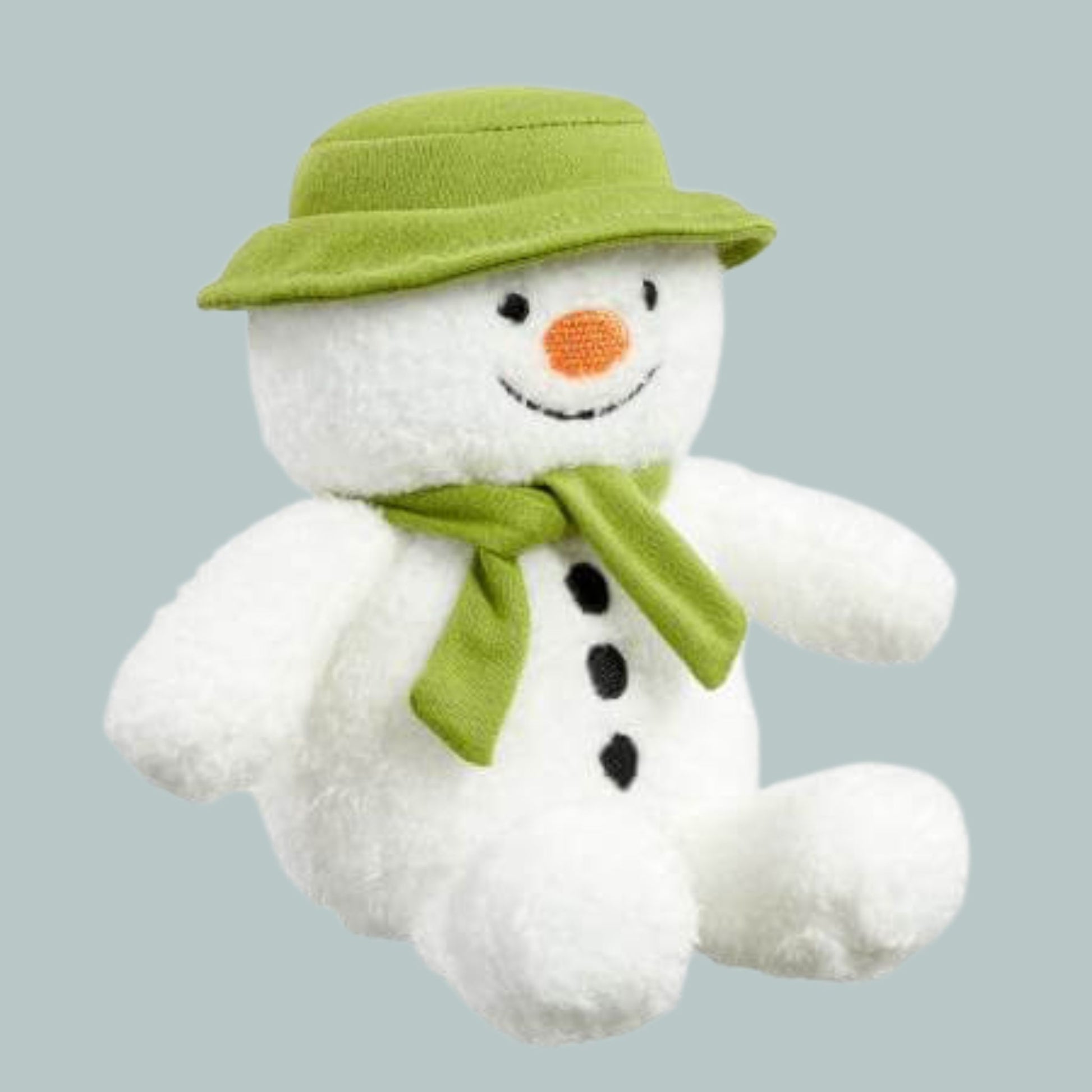 The Snowman plush bean toy wearing a green hat and scarf, with an orange nose