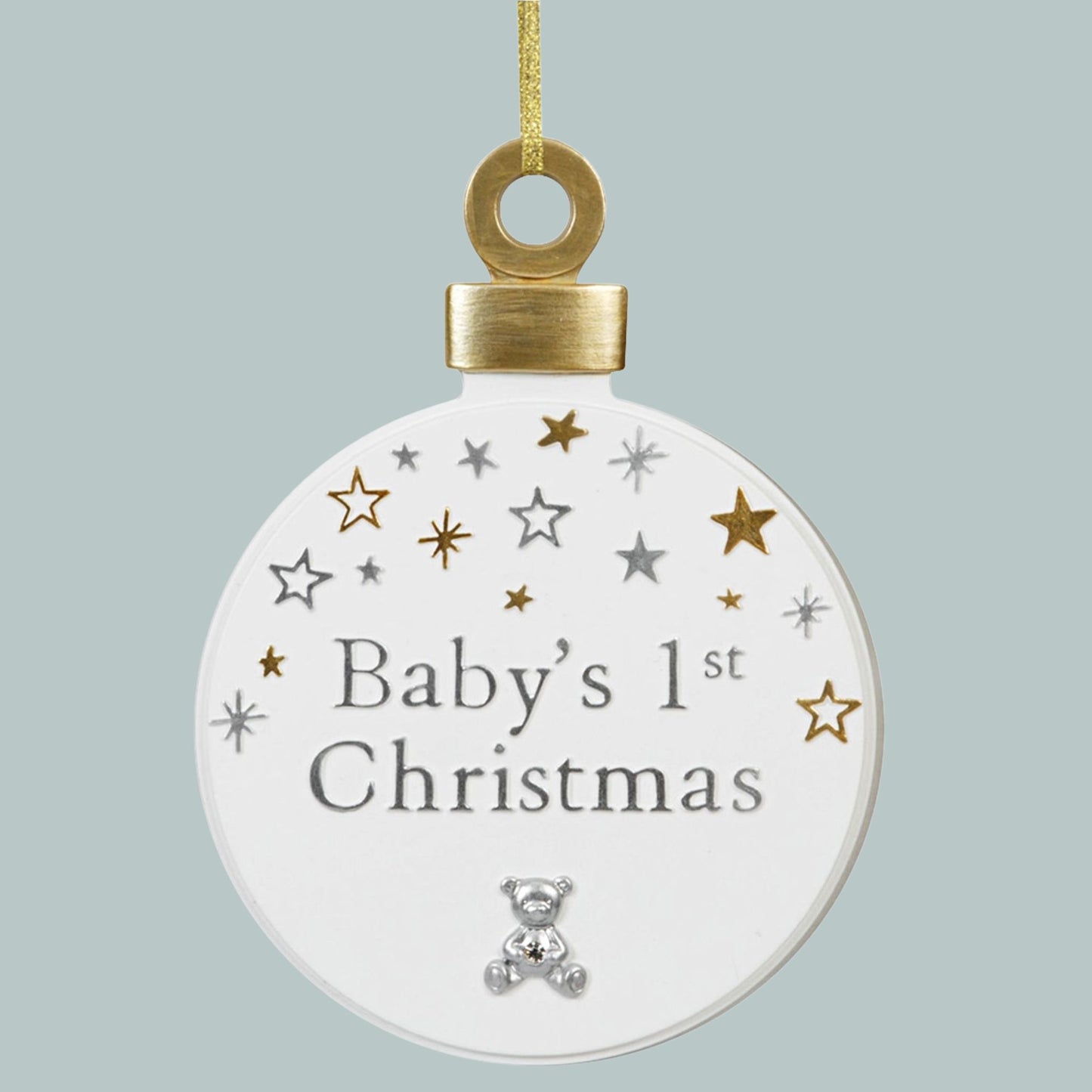 Baby's 1st Christmas' written in silver, stars & teddy design on a round, white hanging plaque