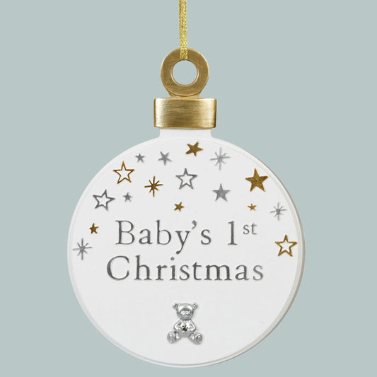 Baby's 1st Christmas' writing, with  silver and gold stars & teddy design on a round, white hanging plaque 