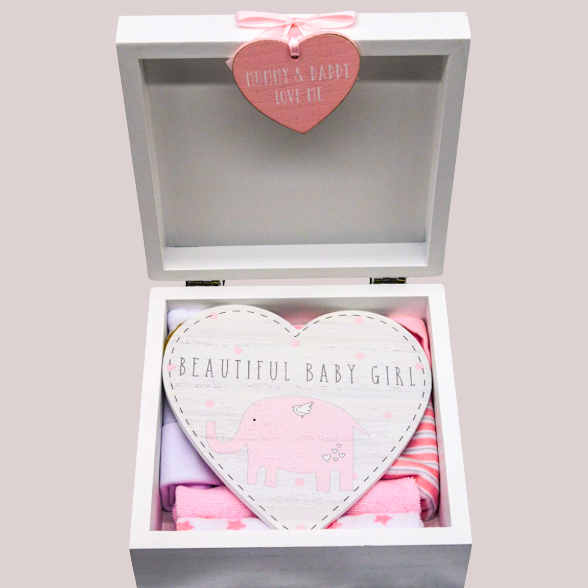 Heart-shaped door plaque with 'Beautiful Baby Girl' text in a gift box on a pink background
