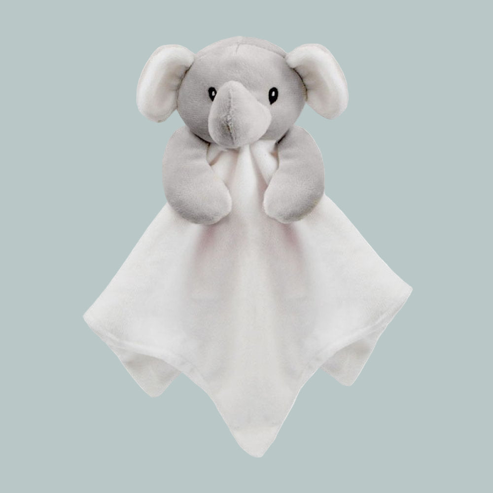 Gray and white elephant comforter with a white blanket on a teal background