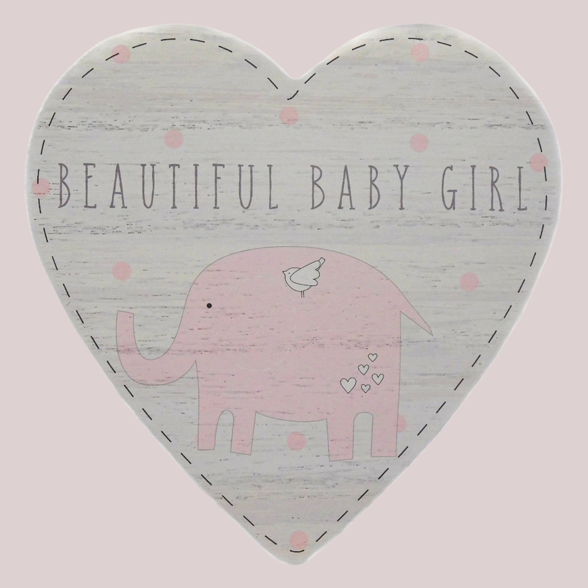 Heart-shaped door hanging plaque with 'Beautiful Baby Girl' text and pink elephant illustration on a light pink background.