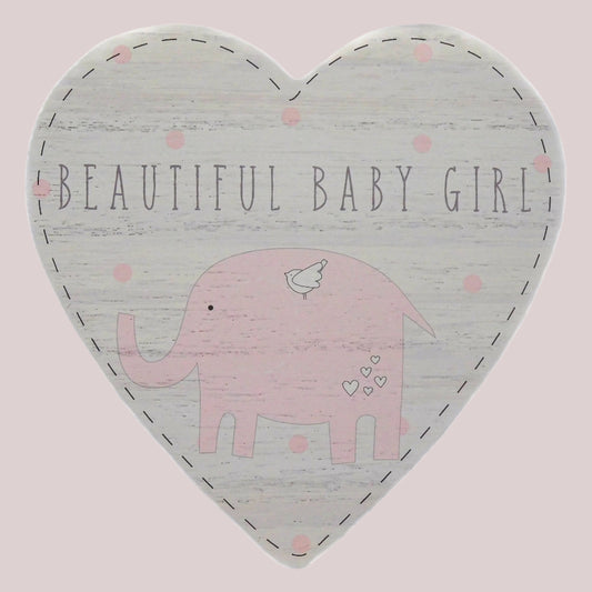 Heart-shaped door hanging plaque with 'Beautiful Baby Girl' text and pink elephant illustration on a light pink background.